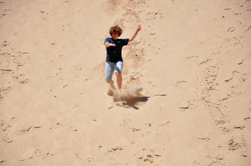Running down Sand Dune in Michigan